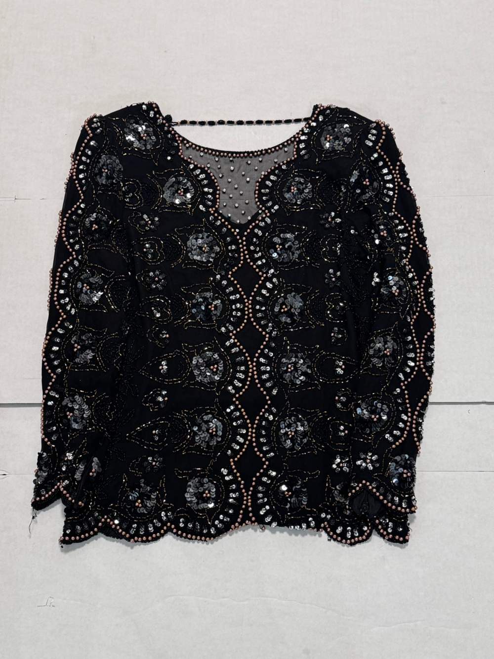 Vintage gold and black 80s silk beaded long sleeve blouse by Oleg
Cassini